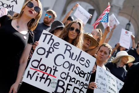 Demonstrators gather outside Los Angeles City Hall to protest the Senate Judiciary committee's vote on President Trump's U.S. Supreme Court pick Brett Kavanaugh, in Los Angeles, California, U.S., September 28, 2018. REUTERS/Mike Blake