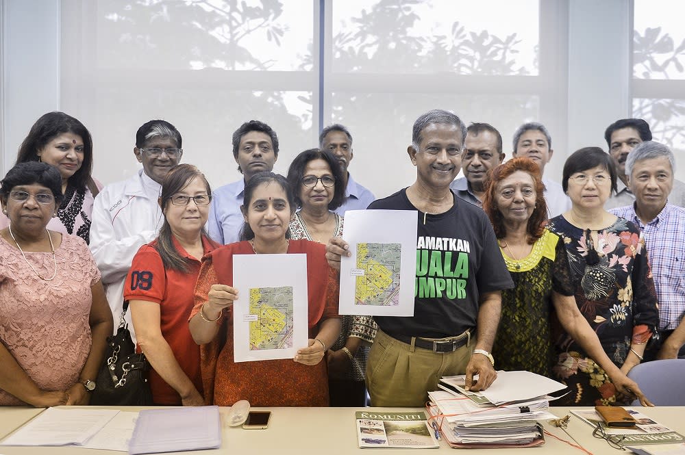 Jalan Abdullah residents pose for a group photo after a press conference at the Bukit Bandaraya Community Hall in Kuala Lumpur February 18 ,2020. — Picture by Miera Zulyana