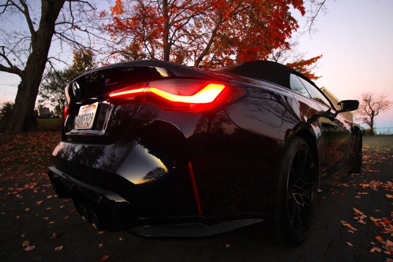 A photo of the tail lights on the BMW M4 Competition Convertible. 