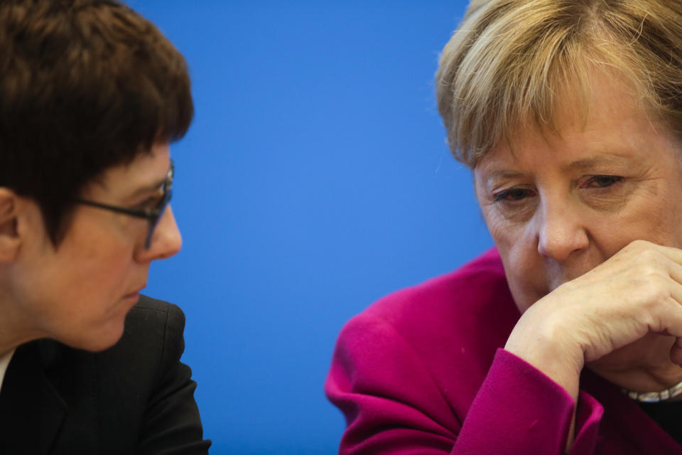 German Christian Democratic Party, CDU, chairwoman and Chancellor Angela Merkel, right, talks with Secretary General Annegret Kramp-Karrenbauer prior to a party's leaders meeting at the headquarters the in Berlin, Germany, Monday, Oct. 29, 2018. (AP Photo/Markus Schreiber)