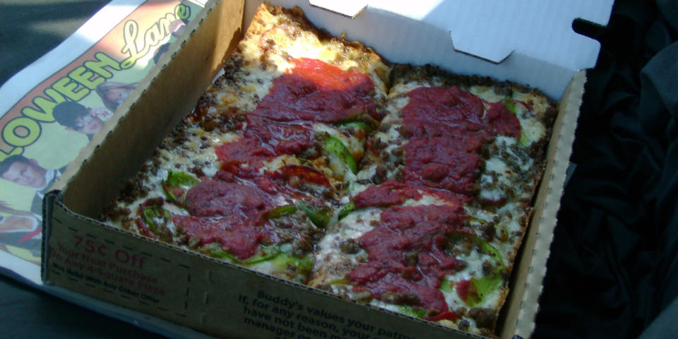 <p>While it looks like it may be an adaptation of Sicilian-style squares, Detroit-style pizza actually gets its rectangular shape from the industrial-parts trays that they were originally baked in. This deep-dish pizza has a crust that is both gluey on the inside and burnt on the edges where the Wisconsin brick cheese that is typically used congeals. Then a slightly sweet tomato sauce is plopped on top of the whole gooey mess. And while they don't serve true Detroit-style pizza, Domino's and Little Caesars were both founded there, which doesn't help Motor City's pizza reputation either …</p>