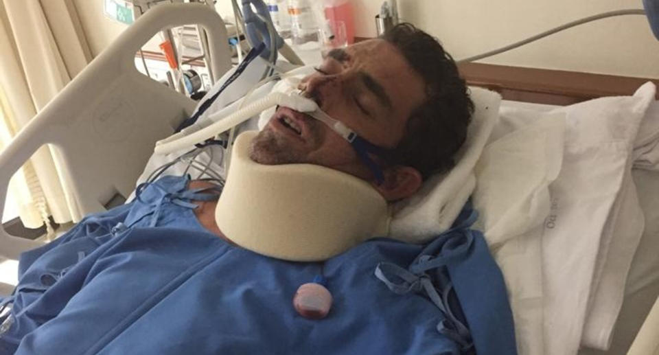 Luke Rampal, pictured in hospital, broke his back and spine in the motorbike crash in Vietnam.