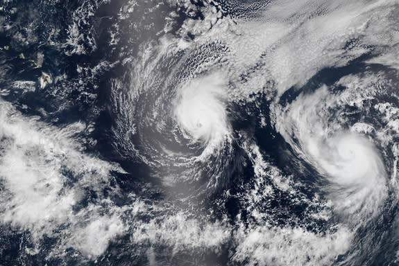 On Aug. 5, NASA's Suomi NPP satellite passed over Hawaii three times to capture images of Hurricane Iselle and Hurricane Julio.