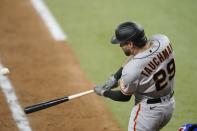 San Francisco Giants' Mike Tauchman hits a grand slam off Texas Rangers relief pitcher Josh Sborz during the eighth inning of a baseball game in Arlington, Texas, Tuesday, June 8, 2021. (AP Photo/Tony Gutierrez)