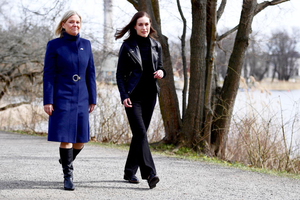 Sweden's Prime Minister Magdalena Andersson walks with Finland's Prime Minister Sanna Marin prior to a meeting, amid Russia's invasion of Ukraine, in Stockholm, Sweden, April 13, 2022. Paul Wennerholm/TT News Agency/via REUTERS      ATTENTION EDITORS - THIS IMAGE WAS PROVIDED BY A THIRD PARTY. SWEDEN OUT. NO COMMERCIAL OR EDITORIAL SALES IN SWEDEN.