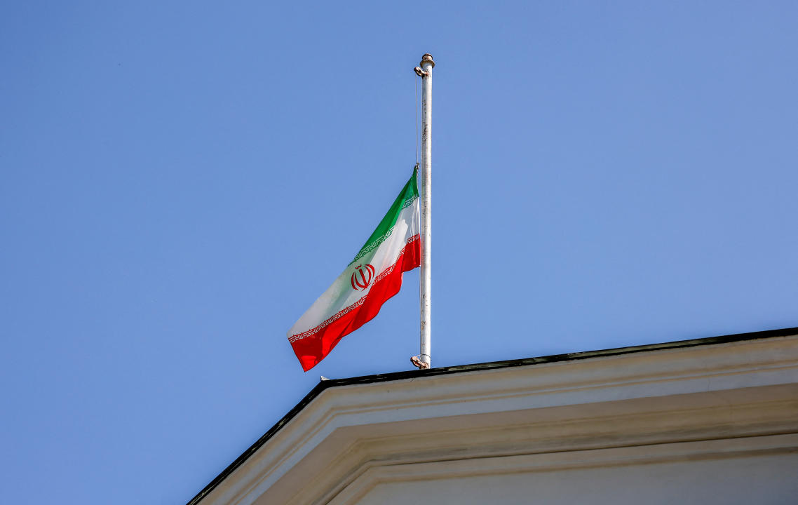 A flag flies at half-mast at the Iranian embassy, after Iran's Supreme Leader Ali Khamenei announced five days of mourning for President Ebrahim Raisi, Foreign Minister Hossein Amirabdollahian and other victims of a recent helicopter crash in mountainous terrain near Iran's border with Azerbaijan, in Moscow, Russia, May 20, 2024. REUTERS/Maxim Shemetov