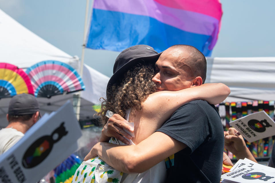 Two people hug during the Williamson County Pride Festival in Franklin, Tenn. (Stephanie Amador / The Tennessean via Imagn file)