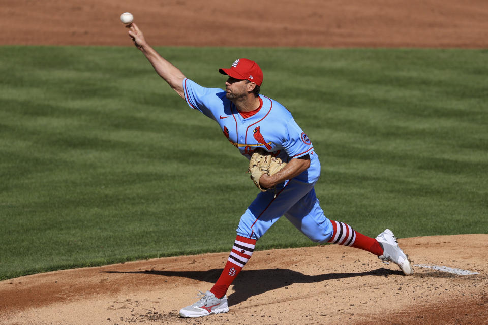 St. Louis Cardinals' Adam Wainwright throws during the first inning of a baseball game against the Cincinnati Reds in Cincinnati, Saturday, April 3, 2021. (AP Photo/Aaron Doster)