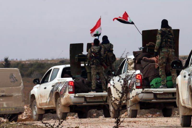 Syrian army soldiers are pictured in western Aleppo province