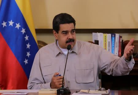 Venezuela's President Nicolas Maduro speaks during a meeting with ministers and pro-government governors in Caracas, Venezuela September 25, 2017. Miraflores Palace/Handout via REUTERS