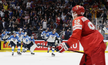 Ice Hockey World Championships - Semifinals - Russia v Finland - Ondrej Nepela Arena, Bratislava, Slovakia - May 25, 2019 Finland's players celebrate after winning the match. REUTERS/David W Cerny