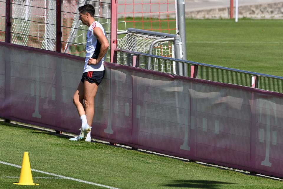 Bayern Munich's Polish forward Robert Lewandowski stands on the side of a pitch during a training session of German first division Bundesliga football team FC Bayern Munich at the club's area in Munich, southern Germany, on July 14, 2022. (Photo by Christof STACHE / AFP) (Photo by CHRISTOF STACHE/AFP via Getty Images)