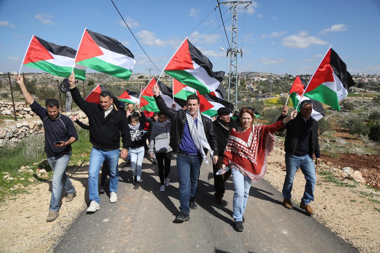 Palestinians stage a protest against Israel's separation wall.&nbsp;&nbsp; (Photo: Issam Rimawi/Getty Images)