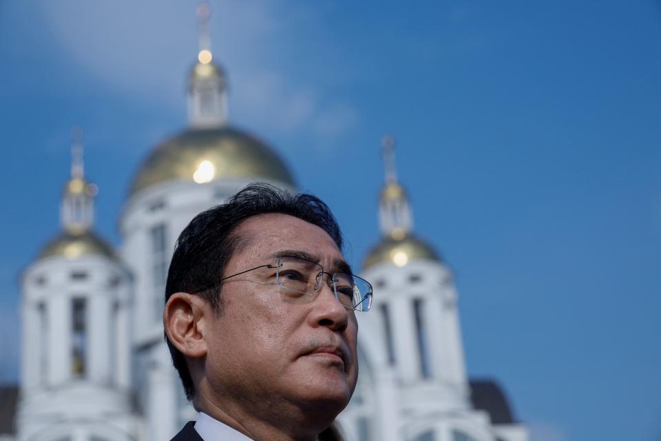 Kishida visits a church at the site of a mass grave in Bucha, near Kyiv (Reuters)