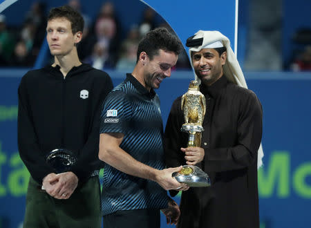 Tennis - ATP - Qatar Open - Khalifa International Tennis and Squash Complex, Doha, Qatar - January 5, 2019 Spain's Roberto Bautista Agut celebrates with the trophy after winning the final against Czech Republic's Tomas Berdych REUTERS/Ibraheem Al Omari