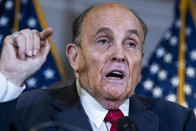 Giuliani, speaks, with a dark drip of hair dye coursing down both cheeks.