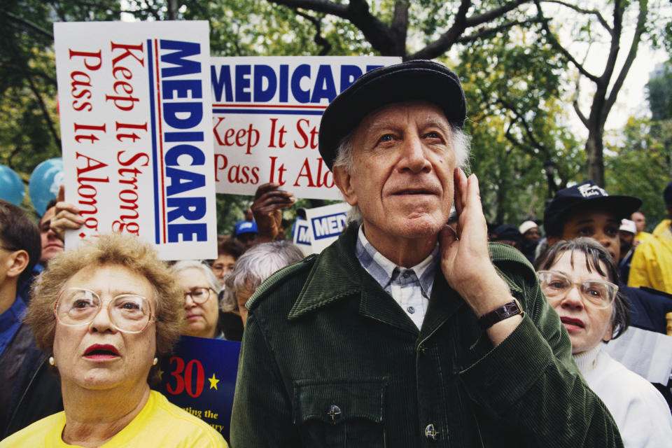 An elderly couple protesting cuts to Medicare at a health care march and rally sponsored by the Keep Patients First, Save Our Health Care Coalition in New York City. (Photo by © Viviane Moos/CORBIS/Corbis via Getty Images)