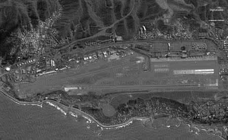 Four Russian military aircrafts, including two Tu-160 (Blackjack) bombers, one An-124 (Condor) heavy-lift cargo airplane and an IL-62 (Classic) passenger aircraft are seen in this DigitalGlobe satellite image at Simon Bolivar Airport in Maiquetia, Vargas, located about 21 kilometres from downtown Caracas, Venezuela in this December 10, 2018 image released on December 11, 2018. Courtesy Satellite image ©2018DigitalGlobe, a Maxar company/Handout via REUTERS