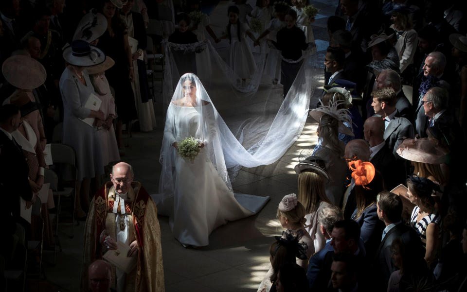 Meghan Markle walks down the aisle as she arrives in St George's Chapel at Windsor Castle for her wedding to Prince Harry in Windsor, Britain, May 19, 2018. Danny Lawson/Pool via REUTERS