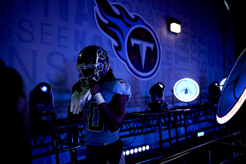 Nov 27, 2022; Nashville, Tennessee, USA; Tennessee Titans running back Dontrell Hilliard (40) heads to the field as the team gets ready to face the <a class="link " href="https://sports.yahoo.com/nfl/teams/cincinnati/" data-i13n="sec:content-canvas;subsec:anchor_text;elm:context_link" data-ylk="slk:Cincinnati Bengals;sec:content-canvas;subsec:anchor_text;elm:context_link;itc:0">Cincinnati Bengals</a> at Nissan Stadium. Mandatory Credit: George Walker IV-USA TODAY Sports