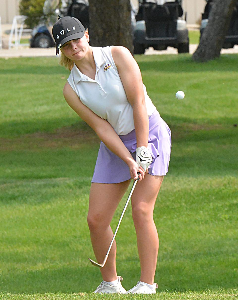 Watertown's Shelby Pearson chips on No. 9 Yellow during the Eastern South Dakota Conference girls golf tournament on Tuesday, May 23, 2023 at Cattail Crossing Golf Course in Watertown.