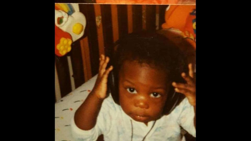 Josh Jones is pictured as a toddler, listening to music in Chicago, Illinois.