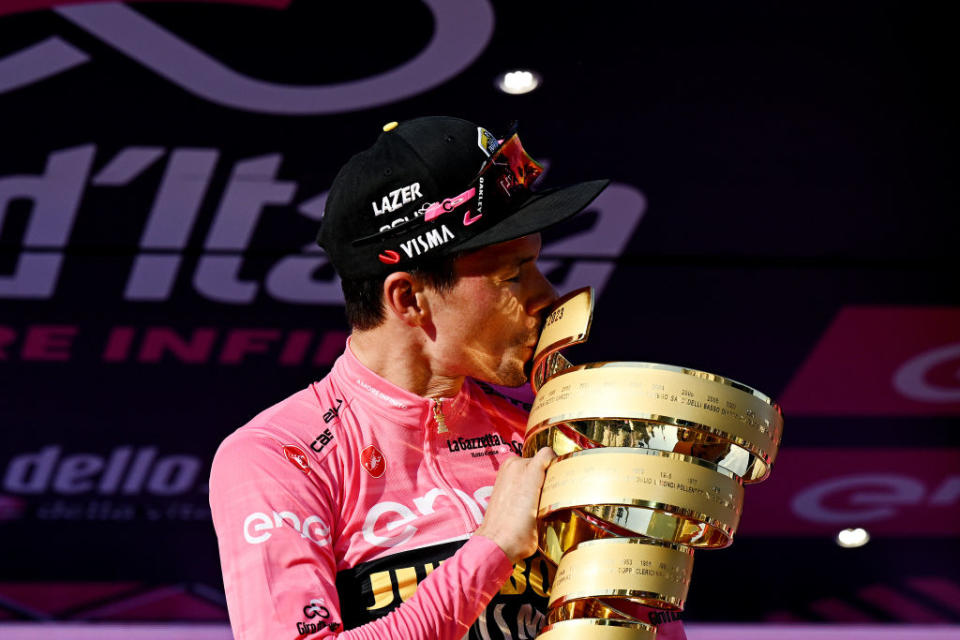 ROME ITALY  MAY 28 Primo Rogli of Slovenia and Team JumboVisma  Pink Leader Jersey celebrates at podium with the Trofeo Senza Fine as final overall race winner during the 106th Giro dItalia 2023 Stage 21 a 126km stage from Rome to Rome  UCIWT  on May 28 2023 in Rome Italy Photo by Stuart FranklinGetty Images