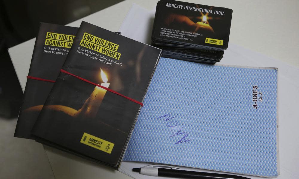 Publicity materials lie on a table at the Amnesty International India headquarters in Bangalore, India.