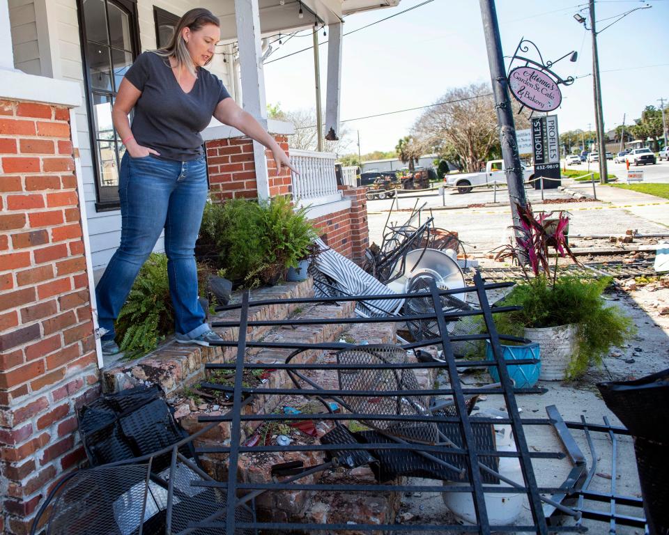 Adonna's Garden Street Cafe co-owner Serena Thomas describes the damage to her family's business tour of the bakery on Monday, March 18, 2024.