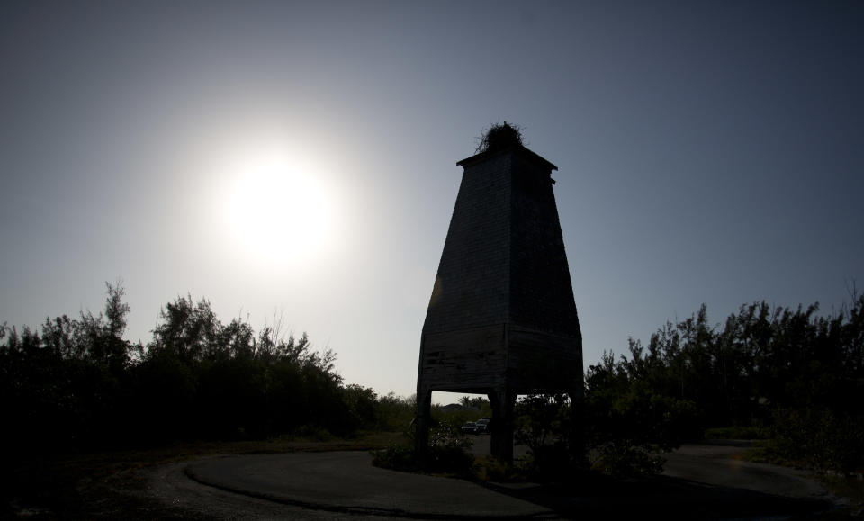 In this Feb. 12, 2013 photo shows the bat tower on Sugarloaf Key, Fla. The 1929 structure was built to lure bats as a way to combat mosquitoes. Bats stayed away, but the tower stands. (AP Photo/J Pat Carter)