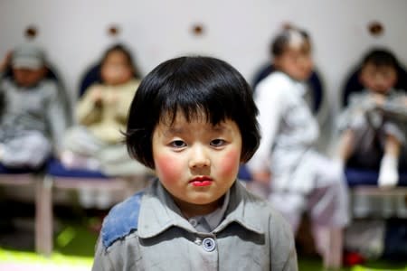 The Wider Image: Busts of leaders a hit in China's porcelain capital