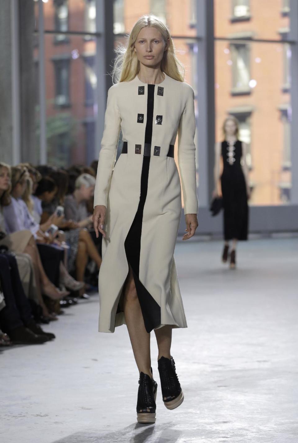 The Proenza Schouler Spring 2014 collection is modeled during Fashion Week in New York, Wednesday, Sept. 11, 2013. (AP Photo/Seth Wenig)