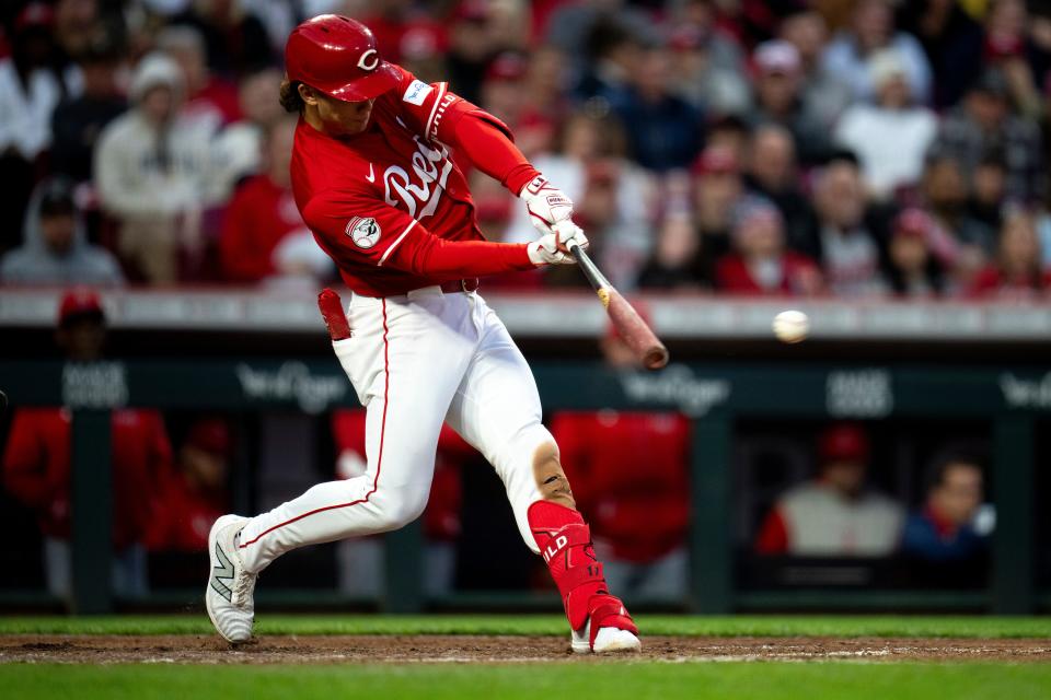 Stuart Fairchild connects on an RBI single in the Reds' two-run fifth inning that proved to be the difference in the Reds' 7-5 victory over the Angels Saturday night. He had two hits batting third against left-handed starter Patrick Sandoval.