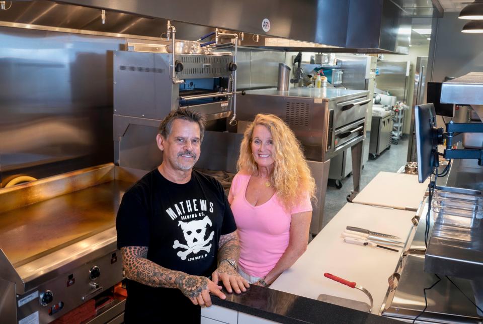 David Mathews and chef Lisa Mercado in the new Mathews Brewing Company Scratch Kitchen in Lake Worth Beach, Florida on November 21, 2023.