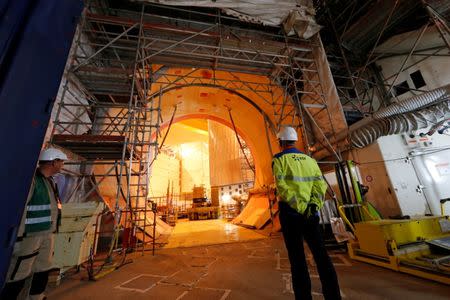 FILE PHOTO: An EDF worker is seen on the construction site of the third-generation European Pressurised Water nuclear reactor (EPR) in Flamanville, France, November 16, 2016. REUTERS/Benoit Tessier/File Photo