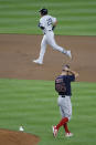 Boston Red Sox pitcher Ryan Weber, right, watches as New York Yankees' Gio Urshela, top, rounds the bases after hitting a home run during the fourth inning of a baseball game at Yankee Stadium, Friday, July 31, 2020, in New York. (AP Photo/Seth Wenig)