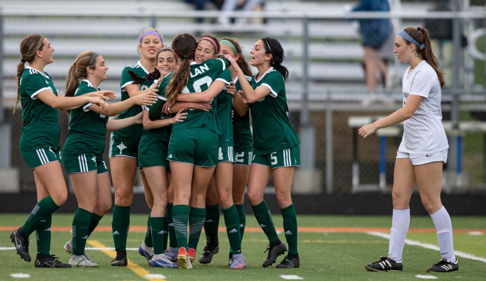 Boylan celebrates Maggie Schmidt's score in the first half against Cary-Grove on Tuesday, May 24, 2022, at Freeport High School in Freeport.