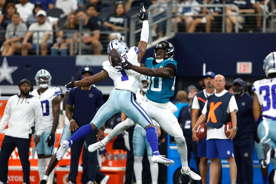 Aug 12, 2023; Arlington, Texas, USA; Jacksonville Jaguars wide receiver Kevin Austin Jr. (80) cannot catch a pass against Dallas Cowboys cornerback Kelvin Joseph (1) in the first quarter at AT&T Stadium. Mandatory Credit: Tim Heitman-USA TODAY Sports