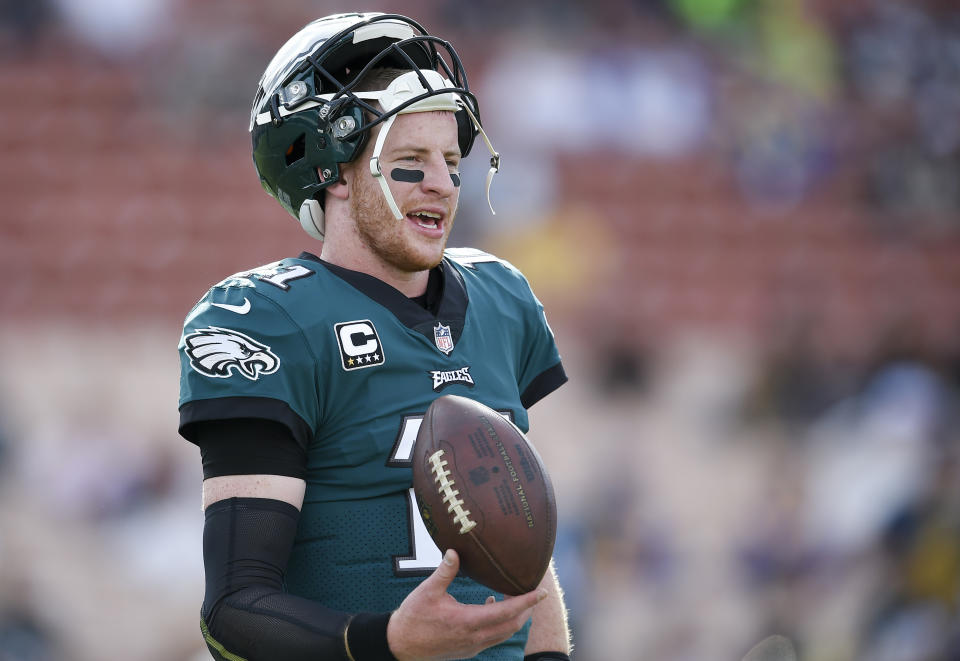 Nothing can stop Carson Wentz from preparing for the next football season. Nothing! (AP Photo)