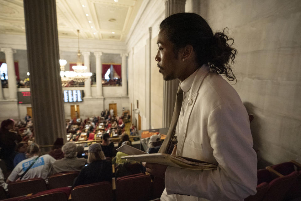 Former Rep. Justin Jones looks for a seat in the gallery of the House chamber after being expelled from the legislature in Nashville, Tenn. (George Walker IV / AP)