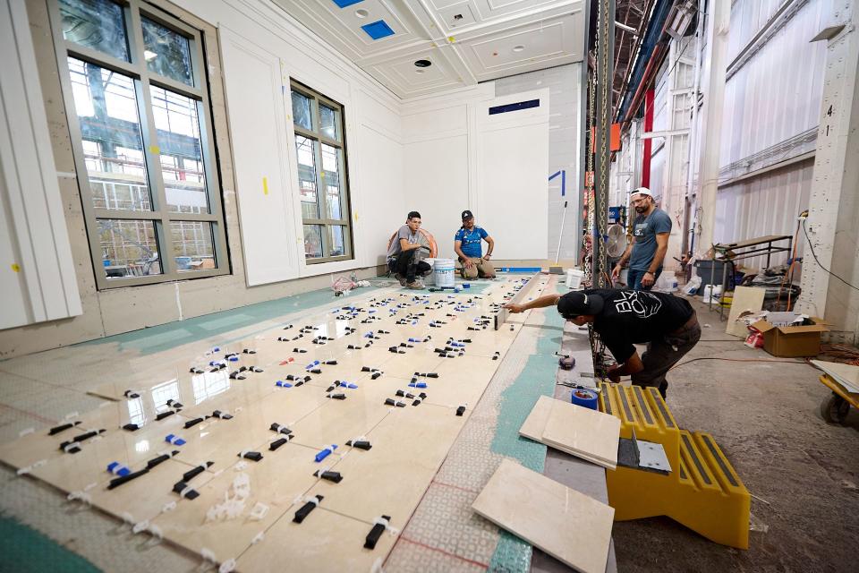 Workers assemble part of the Helena Montana Temple at the 50-acre BLOX facility in Bessemer, Alabama.