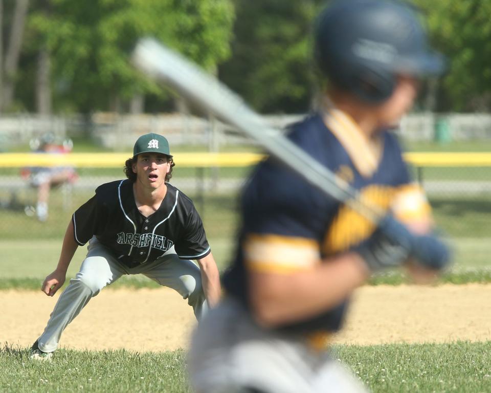 Marshfield third baseman Jack Afanasiw eyes a Hanover batter in the top of the fourth inning of their game against Hanover at Marshfield High School on Thursday, May 26, 2022.