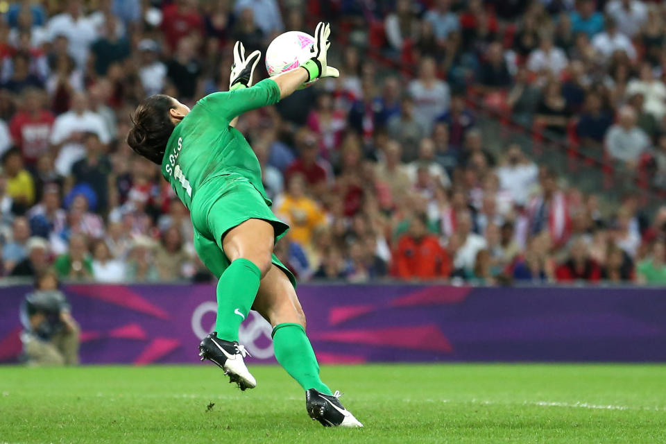 LONDON, ENGLAND - AUGUST 09: Goalkeeper Hope Solo #1 of United States makes a save in the first half while taking on Japan during the Women's Football gold medal match on Day 13 of the London 2012 Olympic Games at Wembley Stadium on August 9, 2012 in London, England. (Photo by Ronald Martinez/Getty Images)