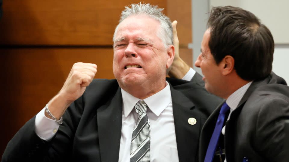 Scot Peterson reacts as he is found not guilty on all charges at the Broward County Courthouse in Fort Lauderdale, Florida, on Thursday. - Amy Beth Bennett/Pool/South Florida Sun-Sentinel/AP