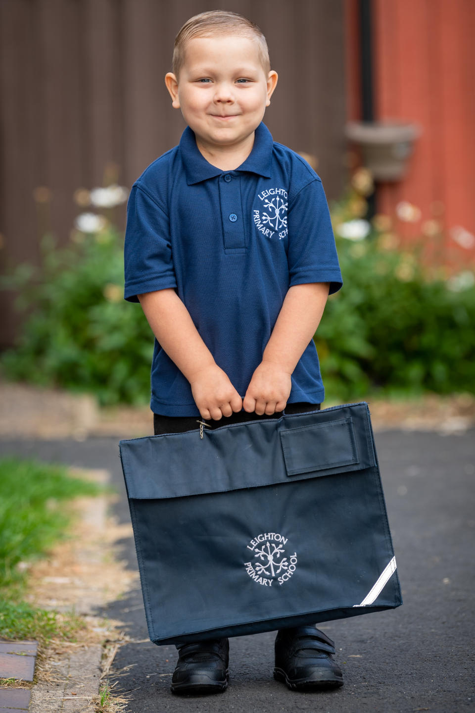 Four-year-old boy who has beaten leukaemia twice in his short life defies the odds to start first day of school