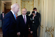 U.S President Joe Biden, left, and Russian President Vladimir Putin walk in a hall during their meeting at the 'Villa la Grange' in Geneva, Switzerland in Geneva, Switzerland, Wednesday, June 16, 2021. (Mikhail Metzel/Pool Photo via AP)