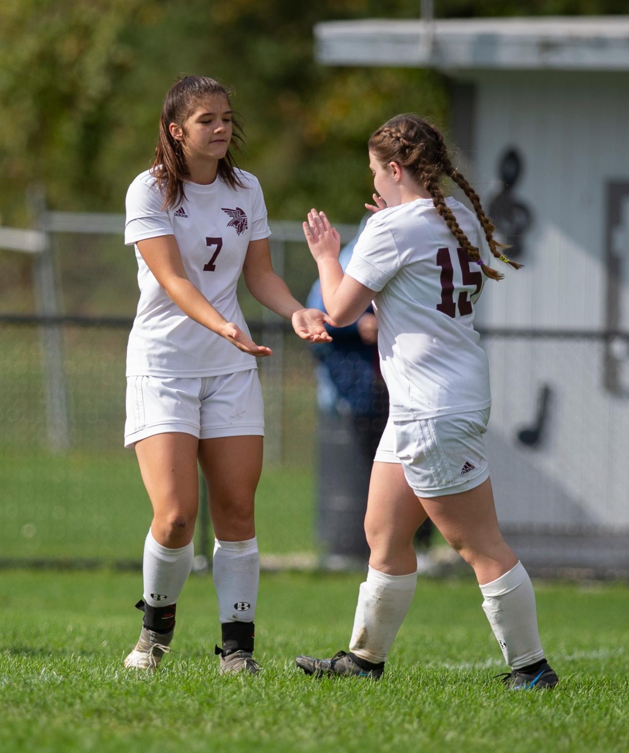 Garrettsville, October 16, 2021- Garfield hosted Waterloo, the Vikings win 5-4. Kaira English and Sydney Jackson react after Jackson's penalty kick score.