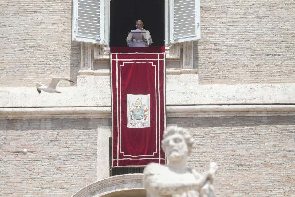 Pope Francis delivers the Regina Coeli noon prayer from his studio window overlooking St. Peter's Square at the Vatican, Sunday, 29, 2002. (AP Photo/Gregorio Borgia)