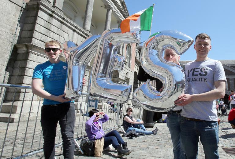 Supporters for same-sex marriage wait for the announcement on the referendum, at Dublin Castle on May 23, 2015