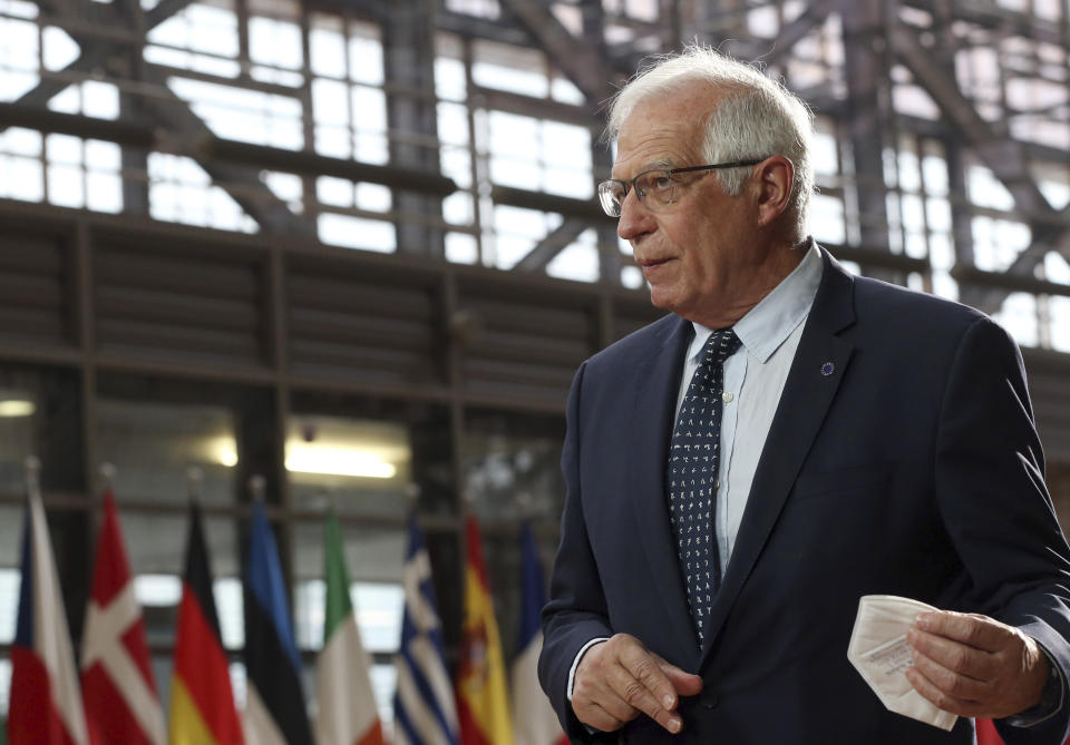 European Union foreign policy chief Josep Borrell speaks with the media as he arrives for a meeting of EU foreign ministers at the European Council building in Brussels, Monday, April 19, 2021. European Union foreign ministers on Monday assessed the bloc's strategy towards Russia in the wake of the military buildup on Ukraine's borders and amid the weakening health of imprisoned opposition leader Alexei Navalny. (Francois Walschaerts, Pool via AP)